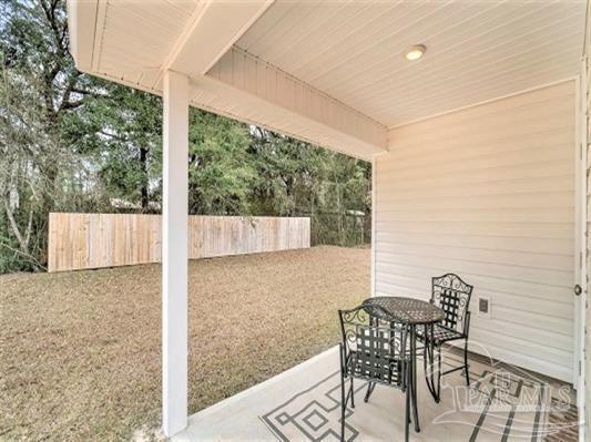3111 Van Day Way Crestview, FL 32539 - Photo 18 of 24 a view of chair and table in the patio