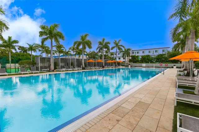 a view of swimming pool from a balcony