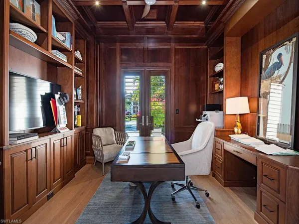 a room with furniture and a book shelf