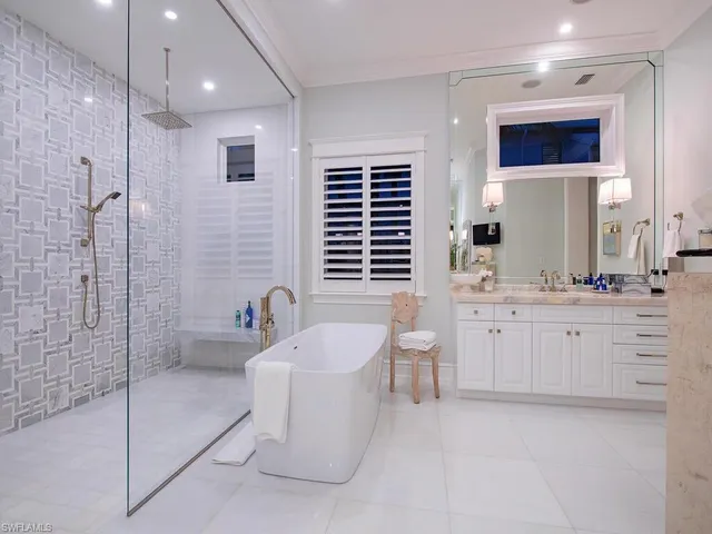 a room with furniture and a chandelier