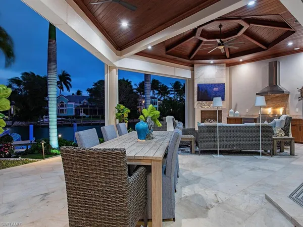 a view of a chairs on the roof deck