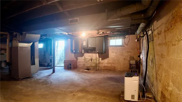 a view of a hallway with seating area