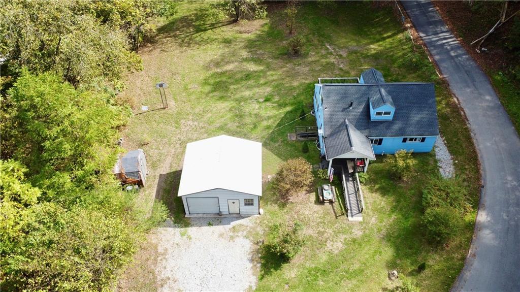 316 Fox Road Charleroi, PA 15022 - Photo 3 of 19 an aerial view of a house with a yard and trees