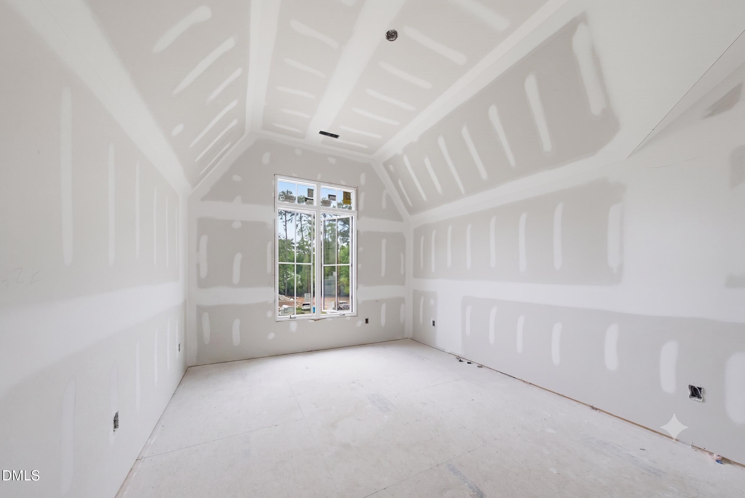 7508 Grist Mill Road Raleigh, NC 27615 - Photo 20 of 32 a view of an empty room with a window