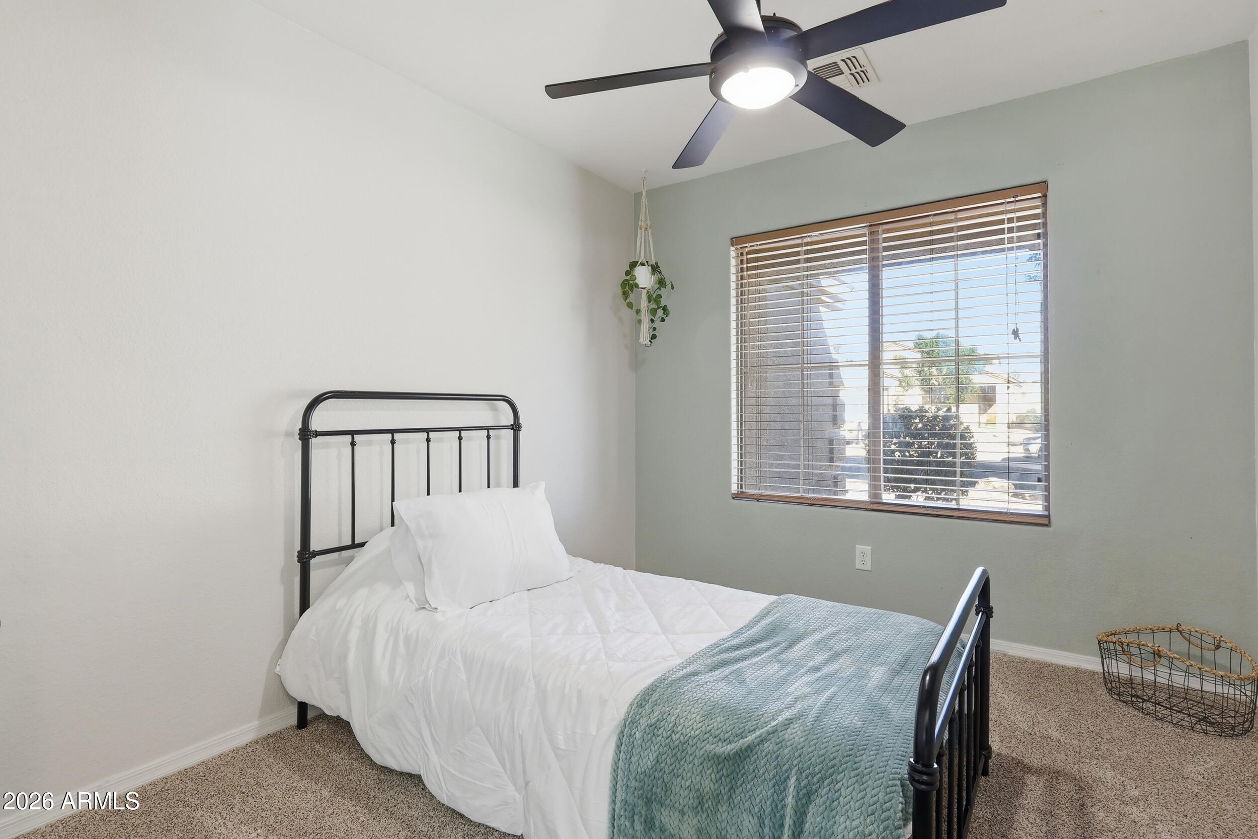 17449 West Calavar Road Surprise, AZ 85388 - Photo 11 of 33 19 - Bedroom 1