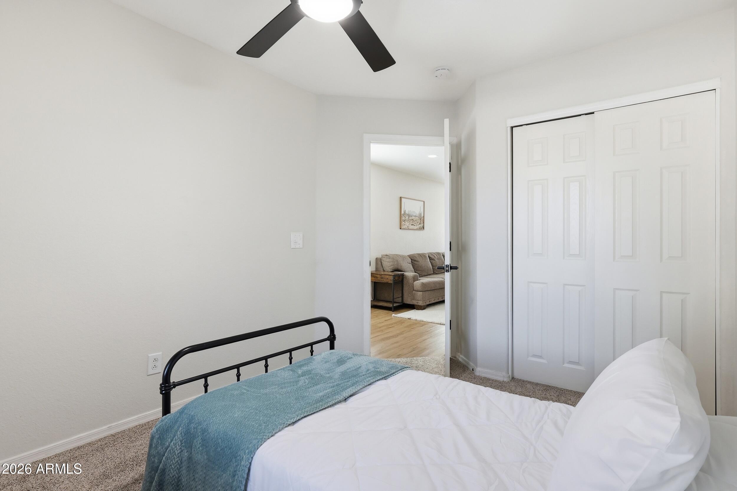 17449 West Calavar Road Surprise, AZ 85388 - Photo 12 of 33 20 - Bedroom 1