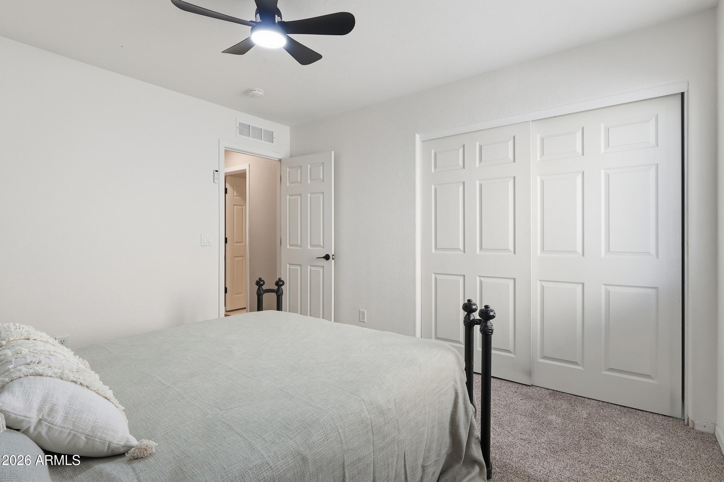 17449 West Calavar Road Surprise, AZ 85388 - Photo 15 of 33 22 - Bedroom 2