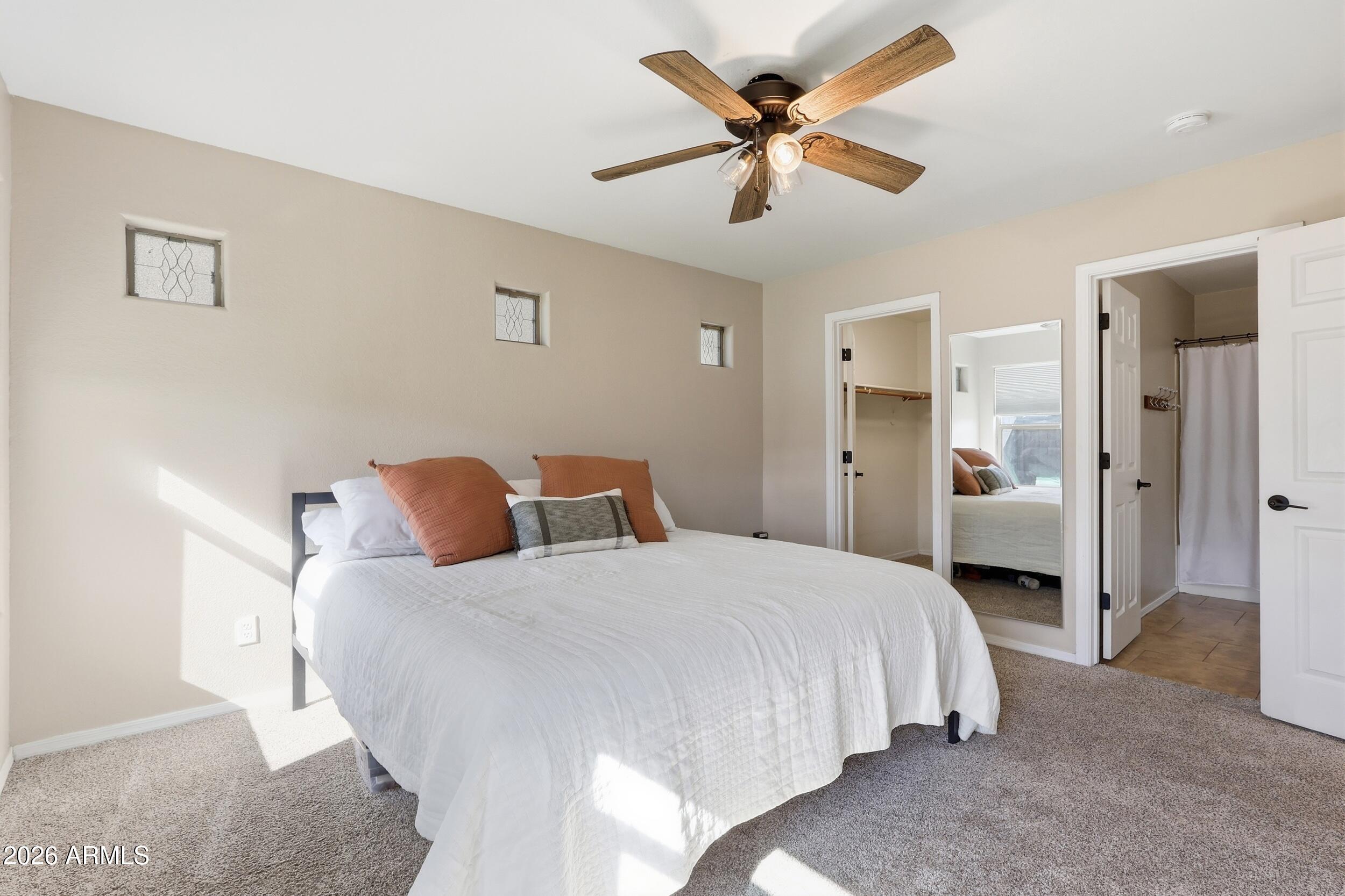 17449 West Calavar Road Surprise, AZ 85388 - Photo 19 of 33 26 - Primary Bedroom