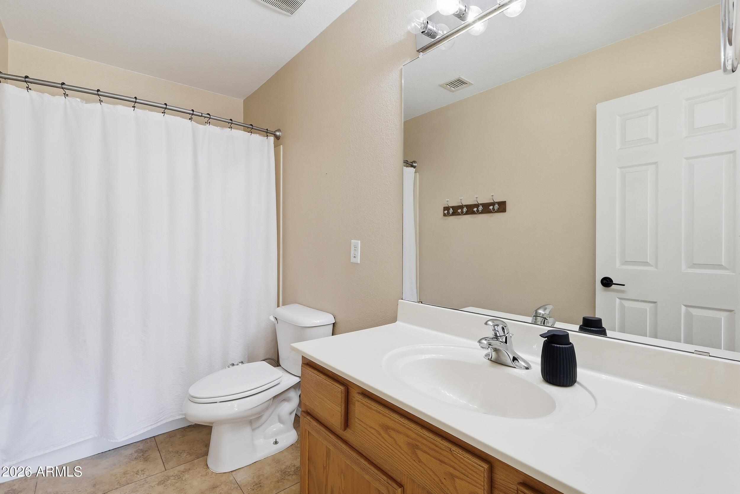 17449 West Calavar Road Surprise, AZ 85388 - Photo 21 of 33 28 - Primary Bathroom