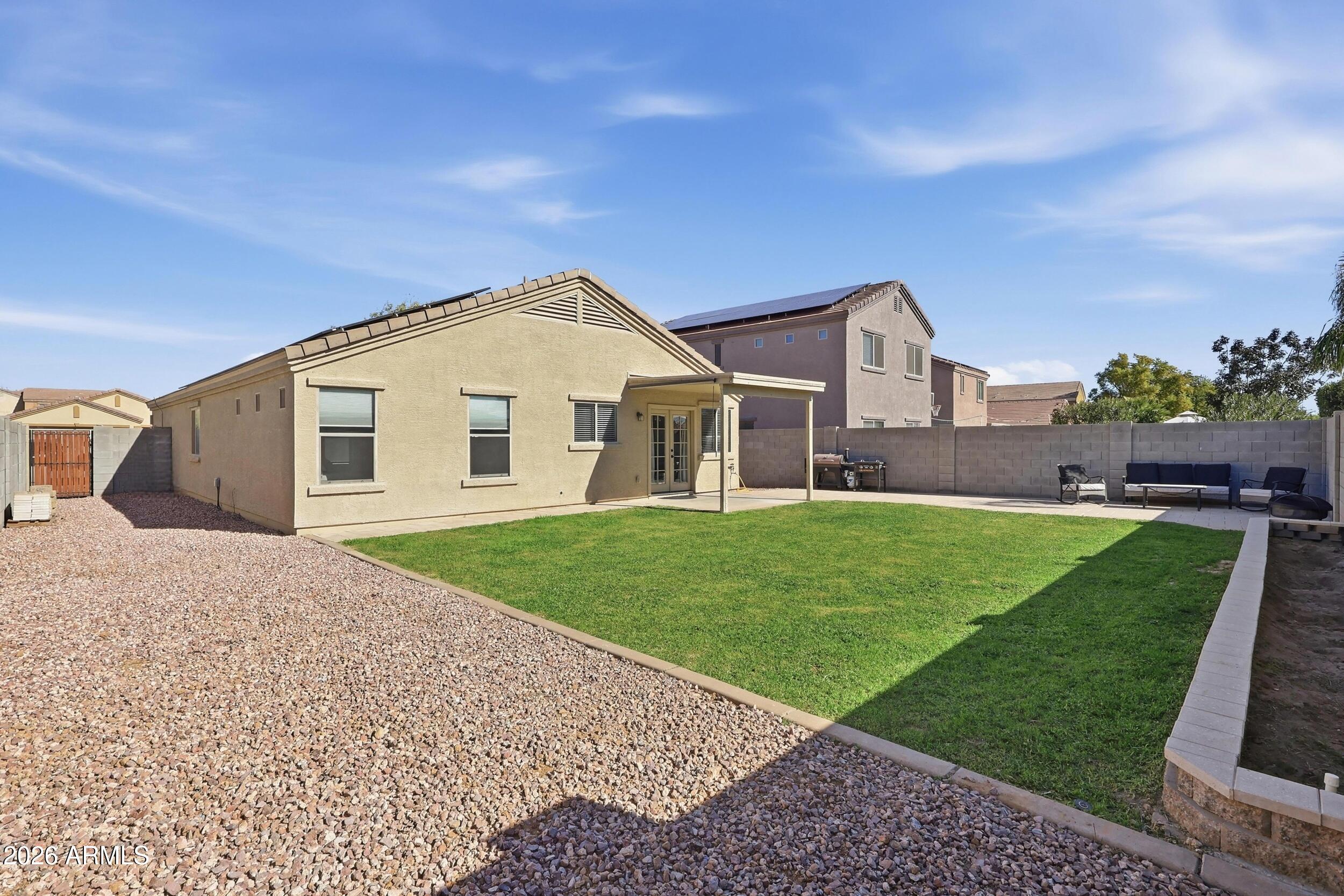 17449 West Calavar Road Surprise, AZ 85388 - Photo 25 of 33 32 - Backyard