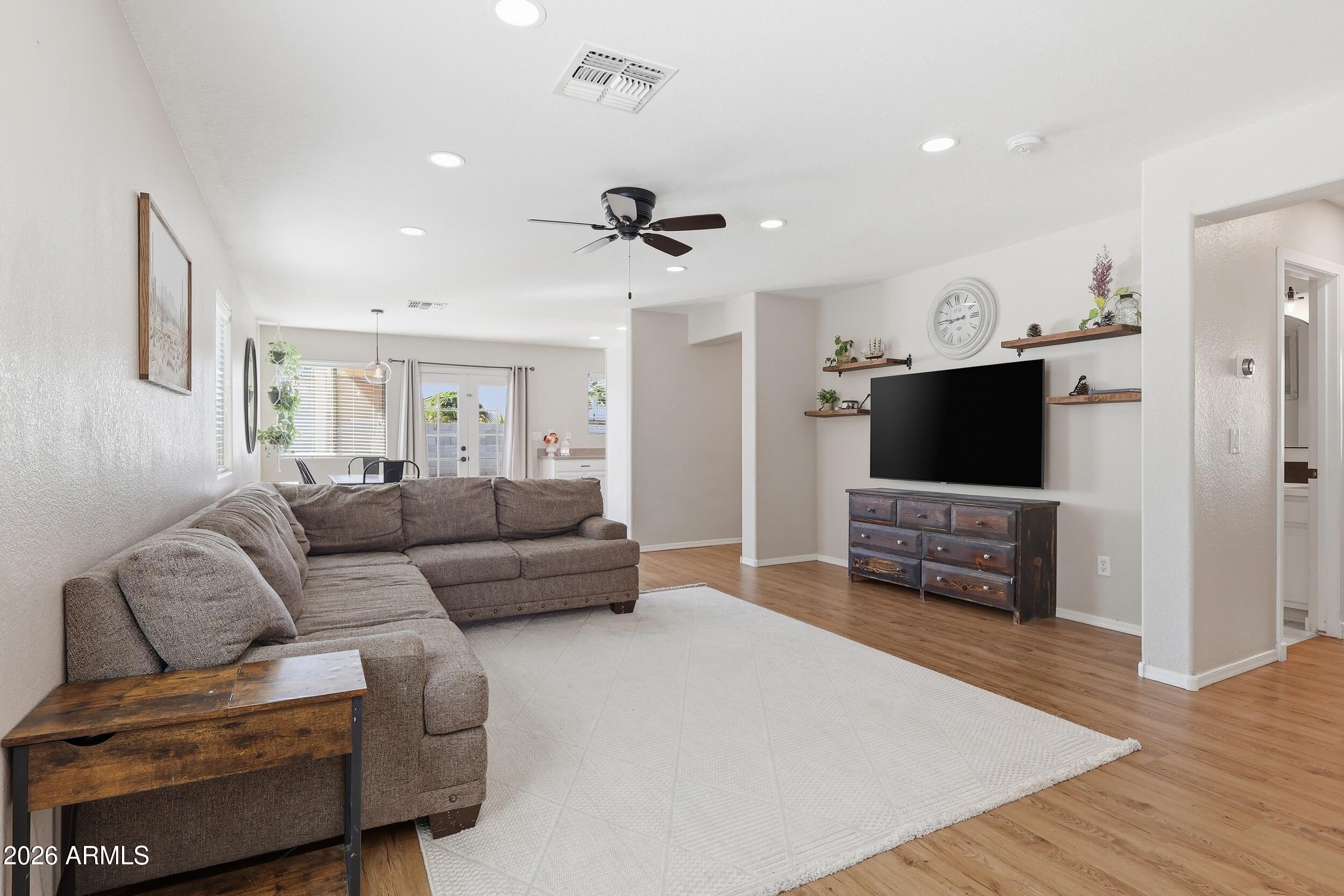 17449 West Calavar Road Surprise, AZ 85388 - Photo 3 of 33 10 - Living Room