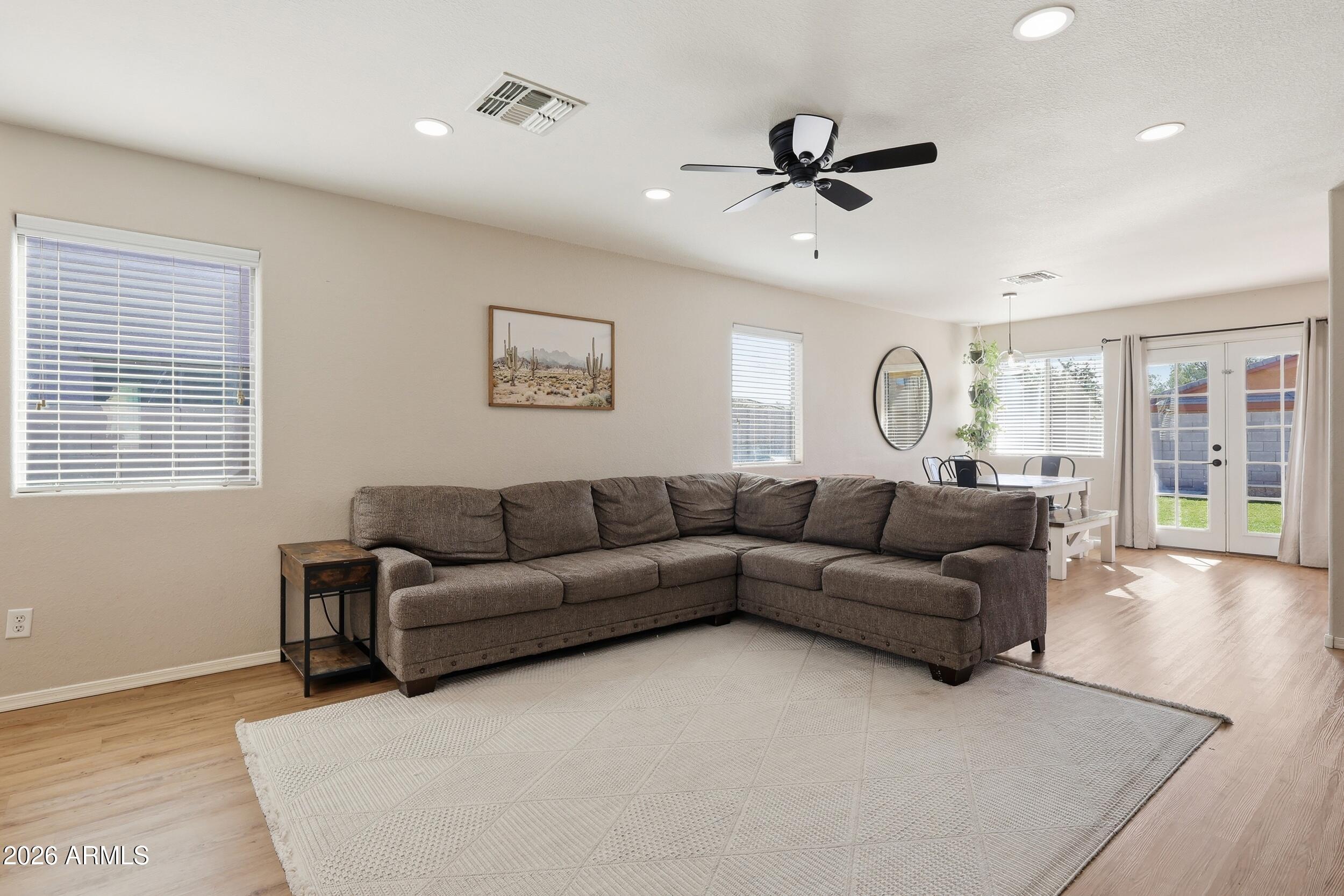 17449 West Calavar Road Surprise, AZ 85388 - Photo 4 of 33 7 - Living Room