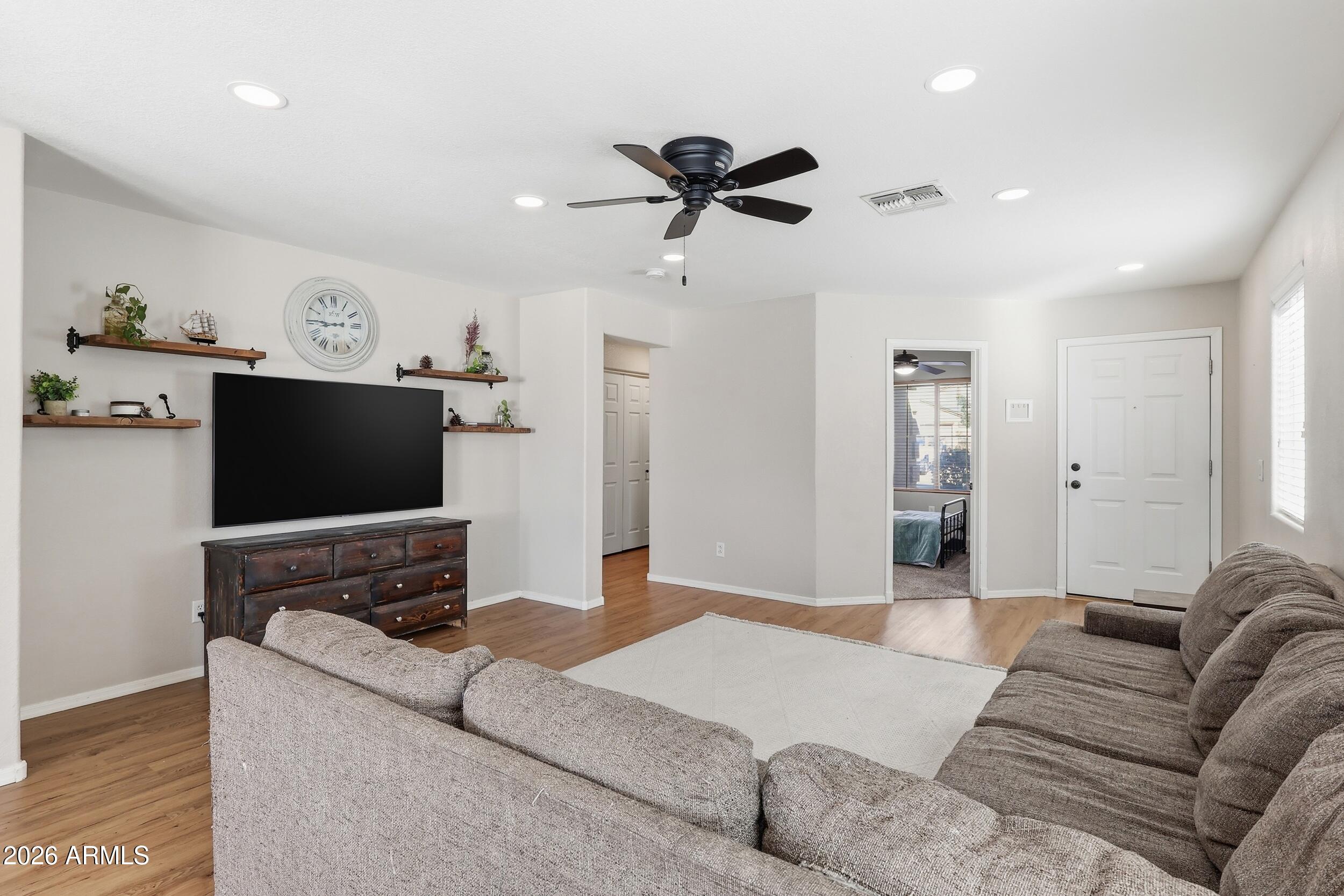 17449 West Calavar Road Surprise, AZ 85388 - Photo 5 of 33 9 - Living Room
