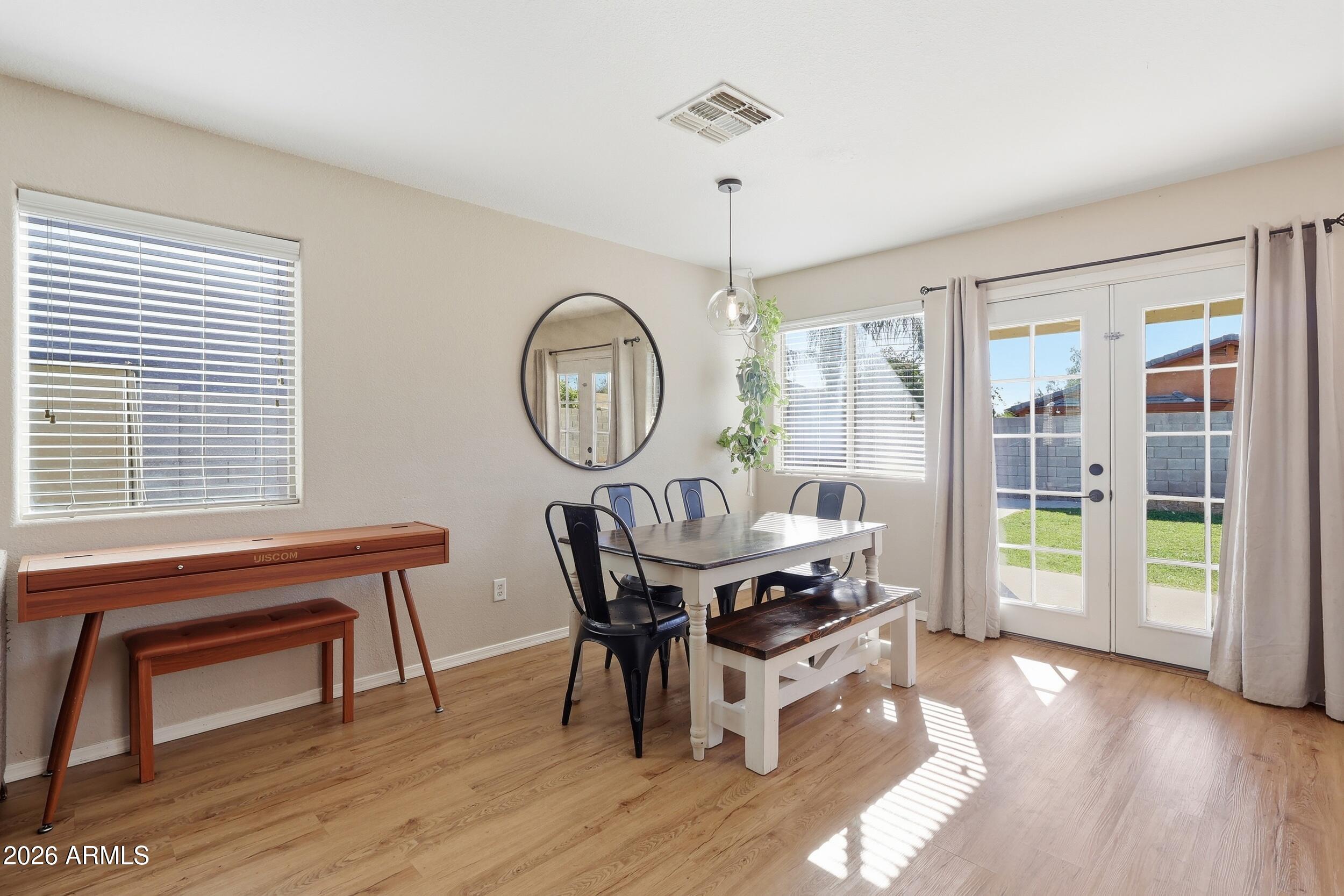 17449 West Calavar Road Surprise, AZ 85388 - Photo 6 of 33 11 - Dining Room
