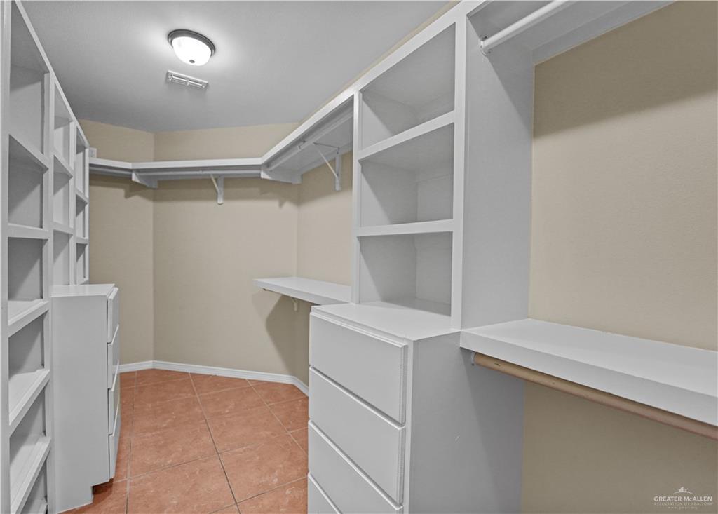 2608 Flamingo Avenue Mission, TX 78574 - Photo 18 of 27 a view of an empty walk in closet