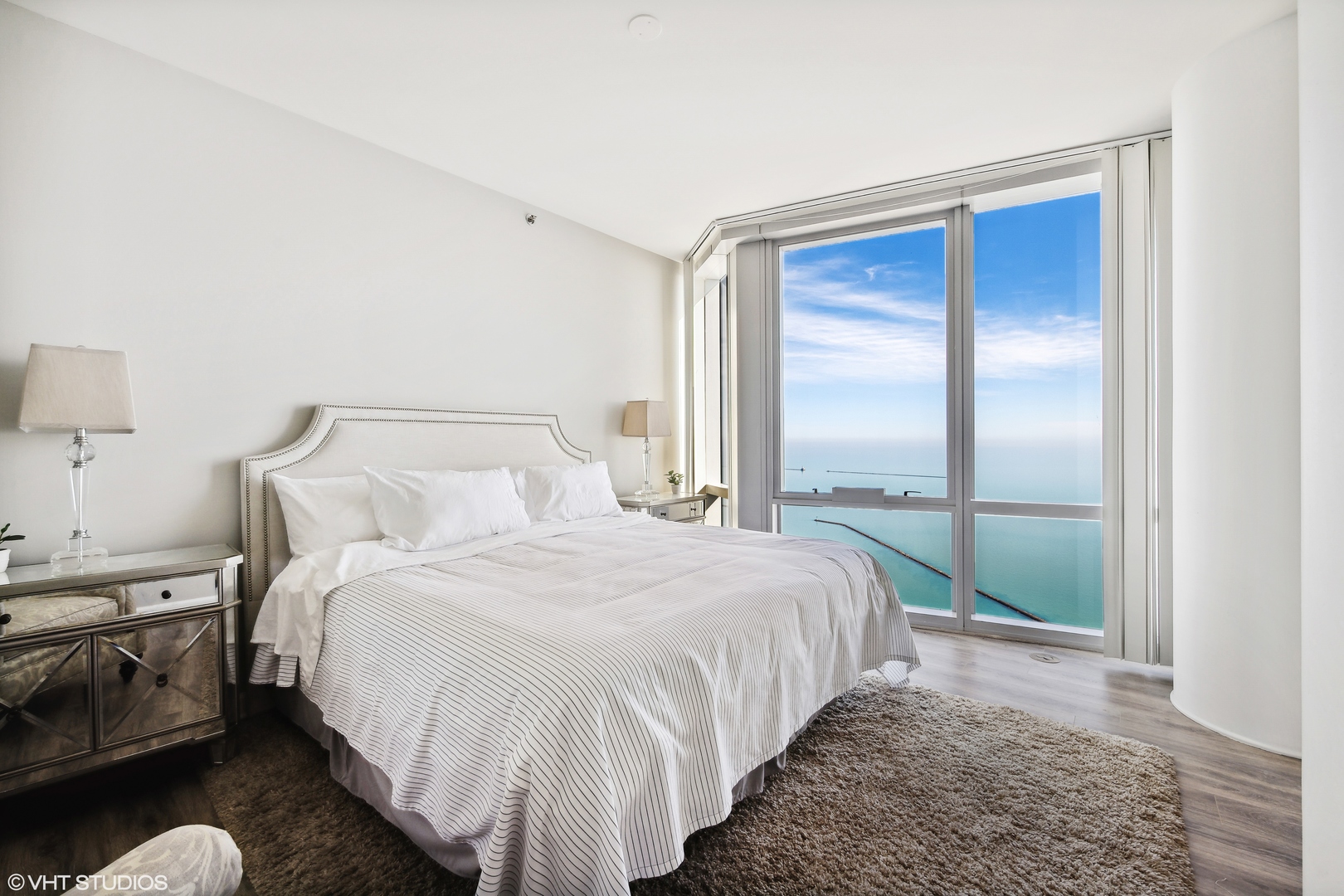 1211 South Prairie Avenue, Unit 5302 Chicago, IL 60605 - Photo 11 of 18 a bedroom with a bed and a window