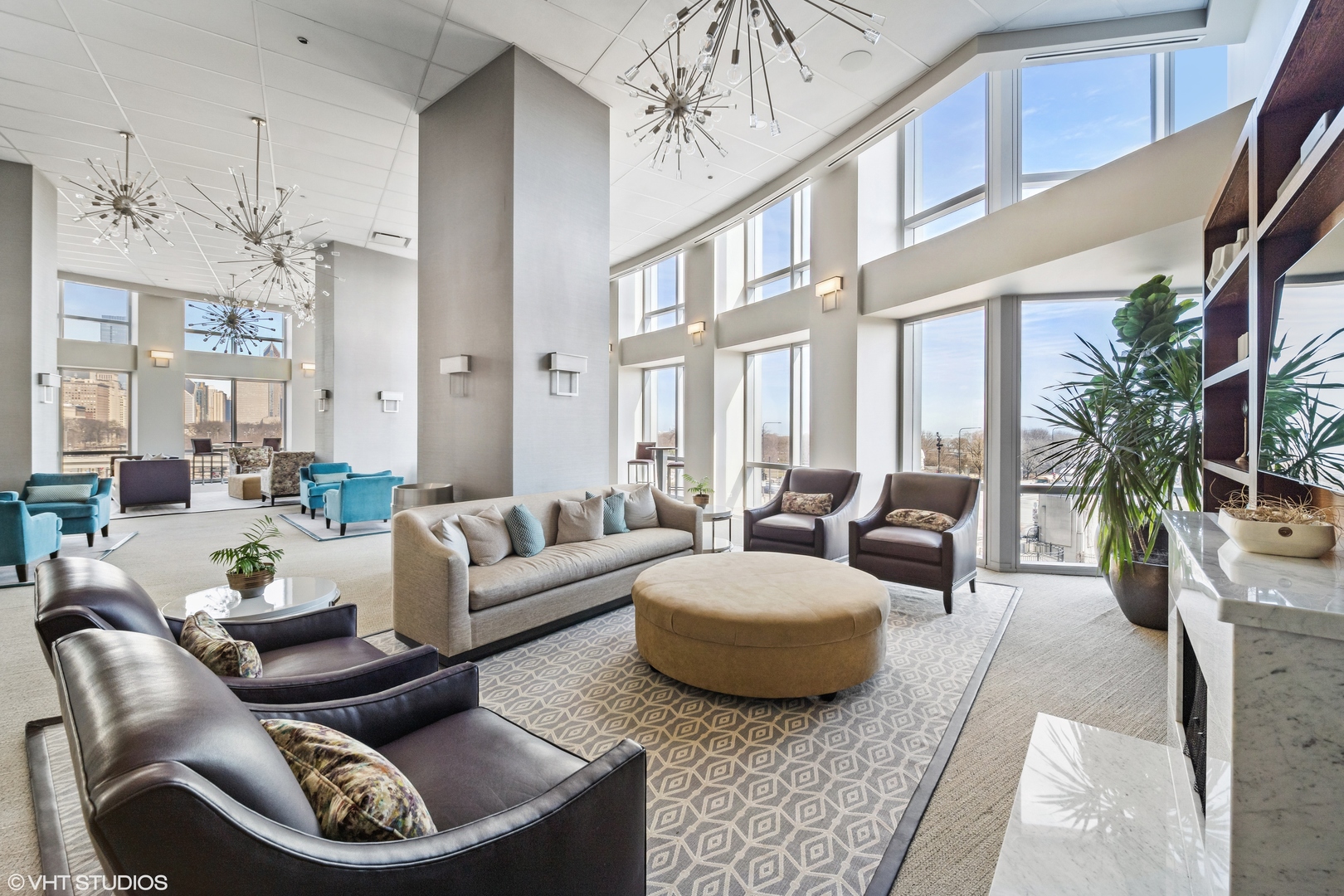 1211 South Prairie Avenue, Unit 5302 Chicago, IL 60605 - Photo 16 of 18 a living room with furniture and a chandelier