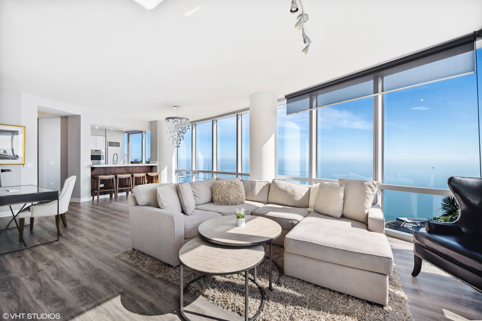 1211 South Prairie Avenue, Unit 5302 Chicago, IL 60605 - Photo 4 of 18 a living room with furniture and wooden floor