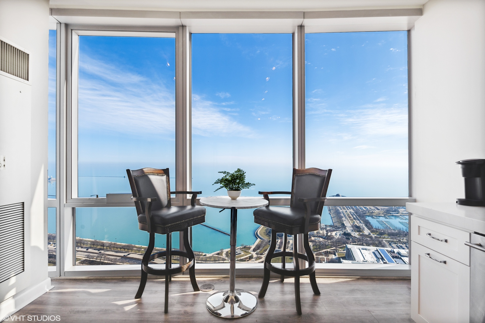 1211 South Prairie Avenue, Unit 5302 Chicago, IL 60605 - Photo 7 of 18 a view of a dining room with furniture window and outside view