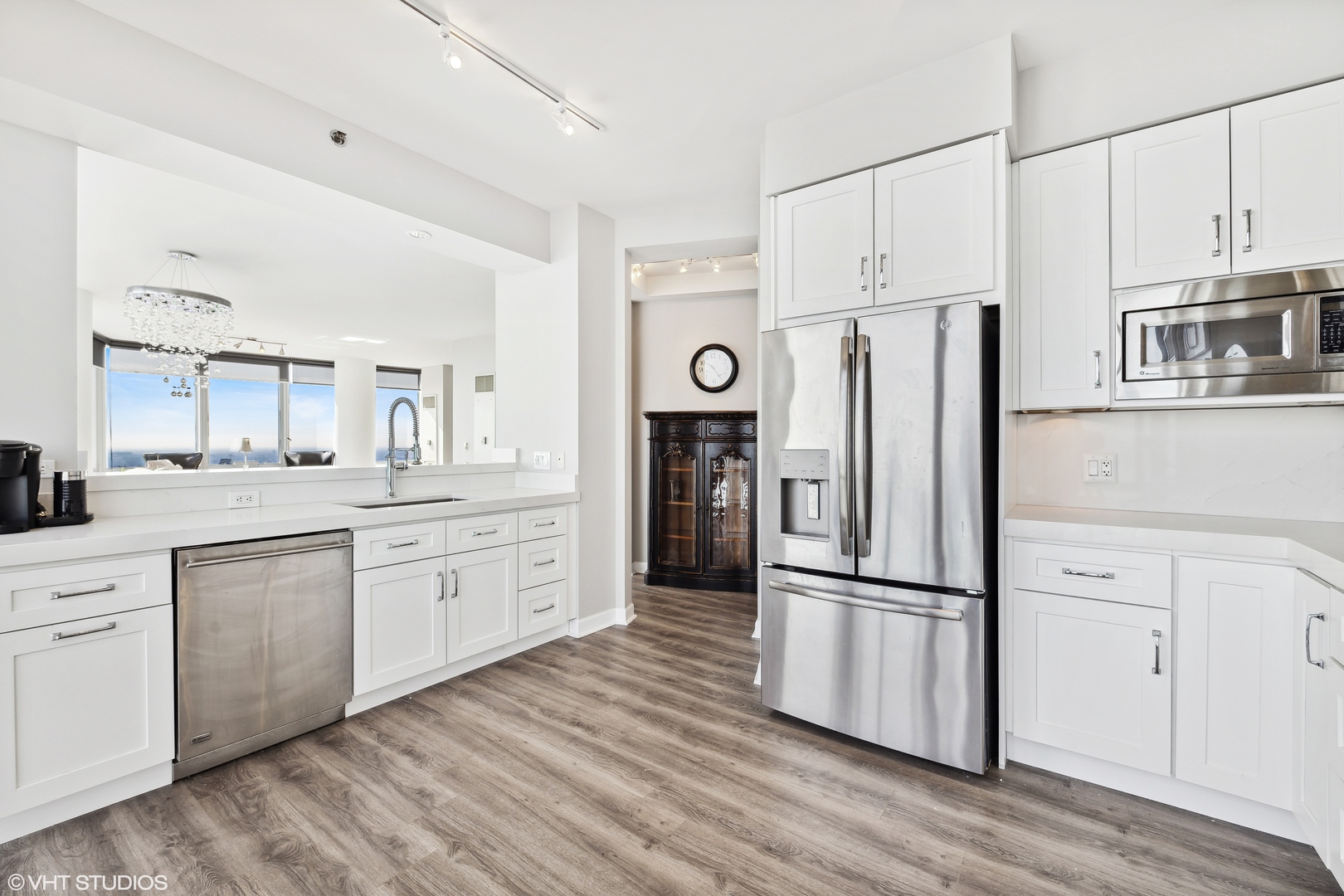 1211 South Prairie Avenue, Unit 5302 Chicago, IL 60605 - Photo 9 of 18 a kitchen with stainless steel appliances a refrigerator sink and cabinets