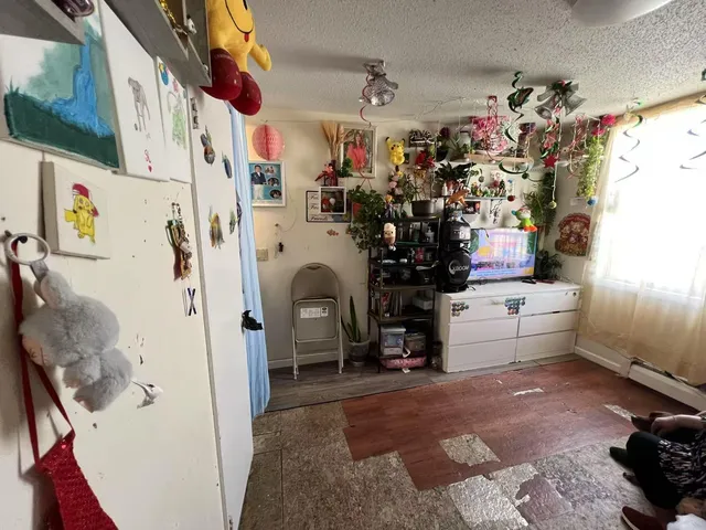 a kitchen with a sink cabinets and appliances