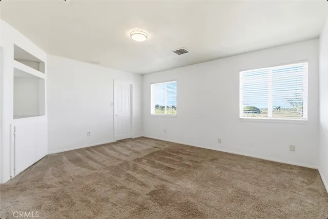 a view of an empty room with window