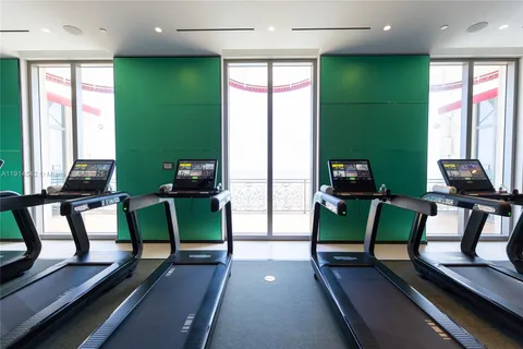 a view of a balcony and city view