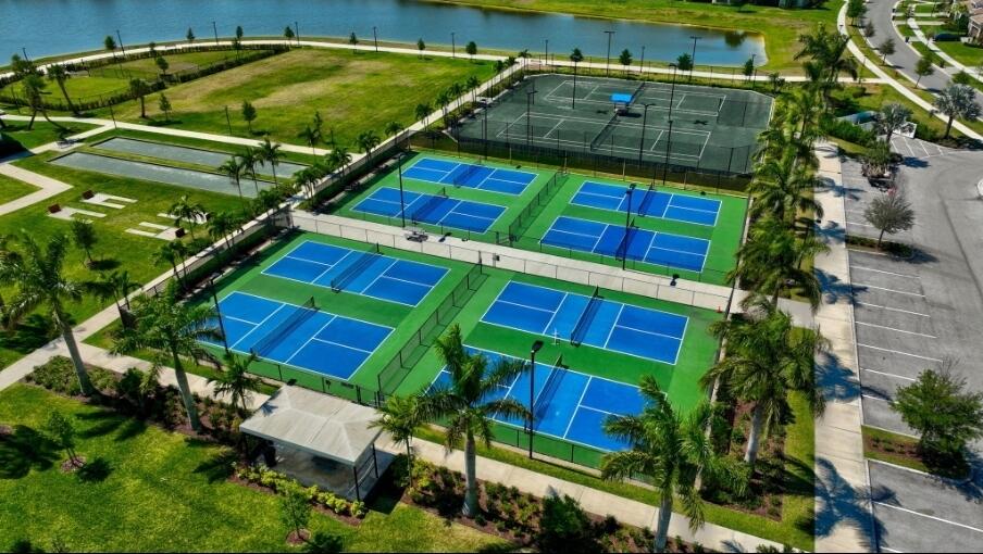 5243 Rivo Alto Circle Loxahatchee, FL 33470 - Photo 33 of 51 Pickeball court and tennis