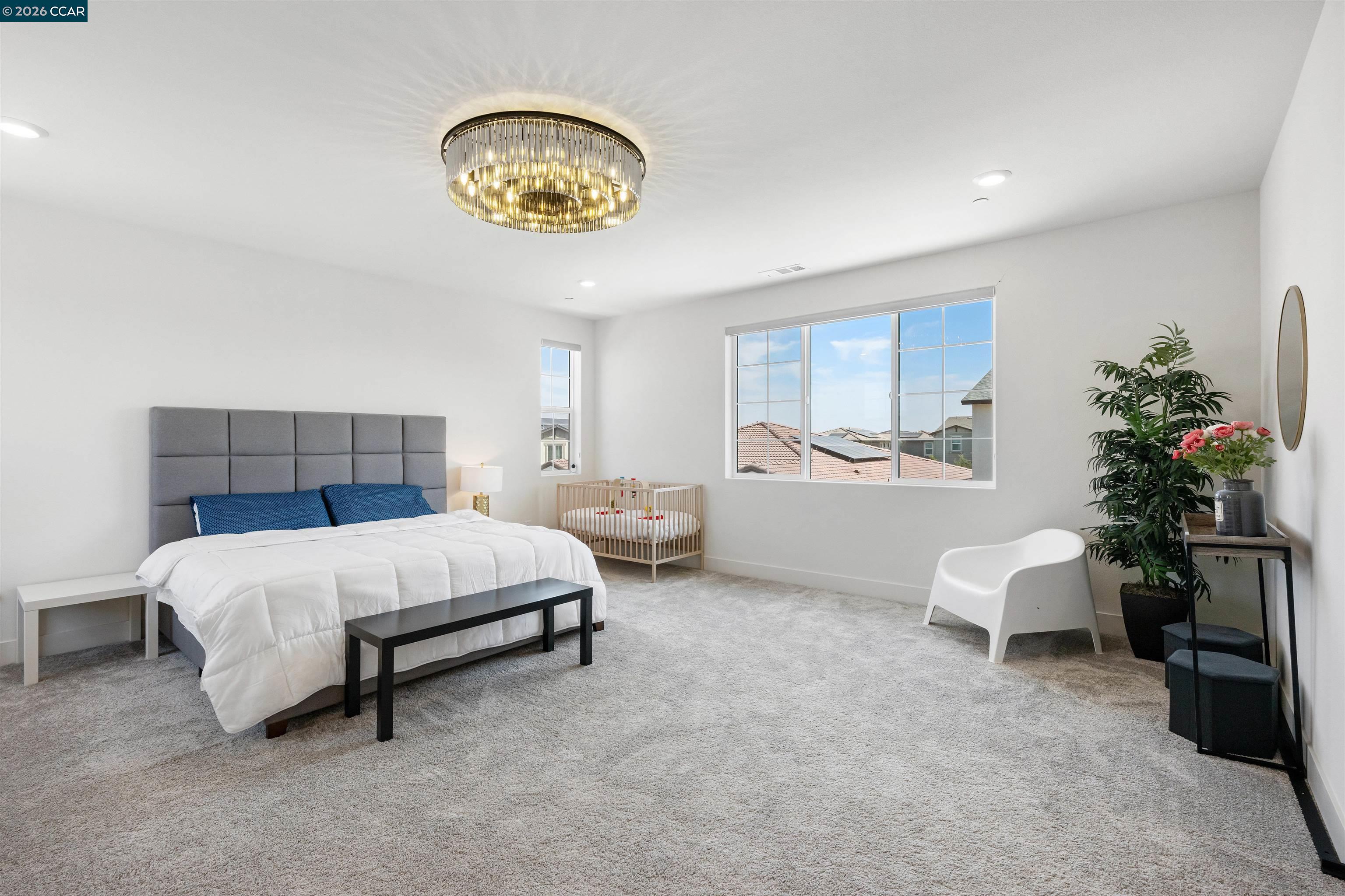 6274 Carousel Avenue Tracy, CA 95377 - Photo 23 of 46 a bedroom with a bed furniture and a window