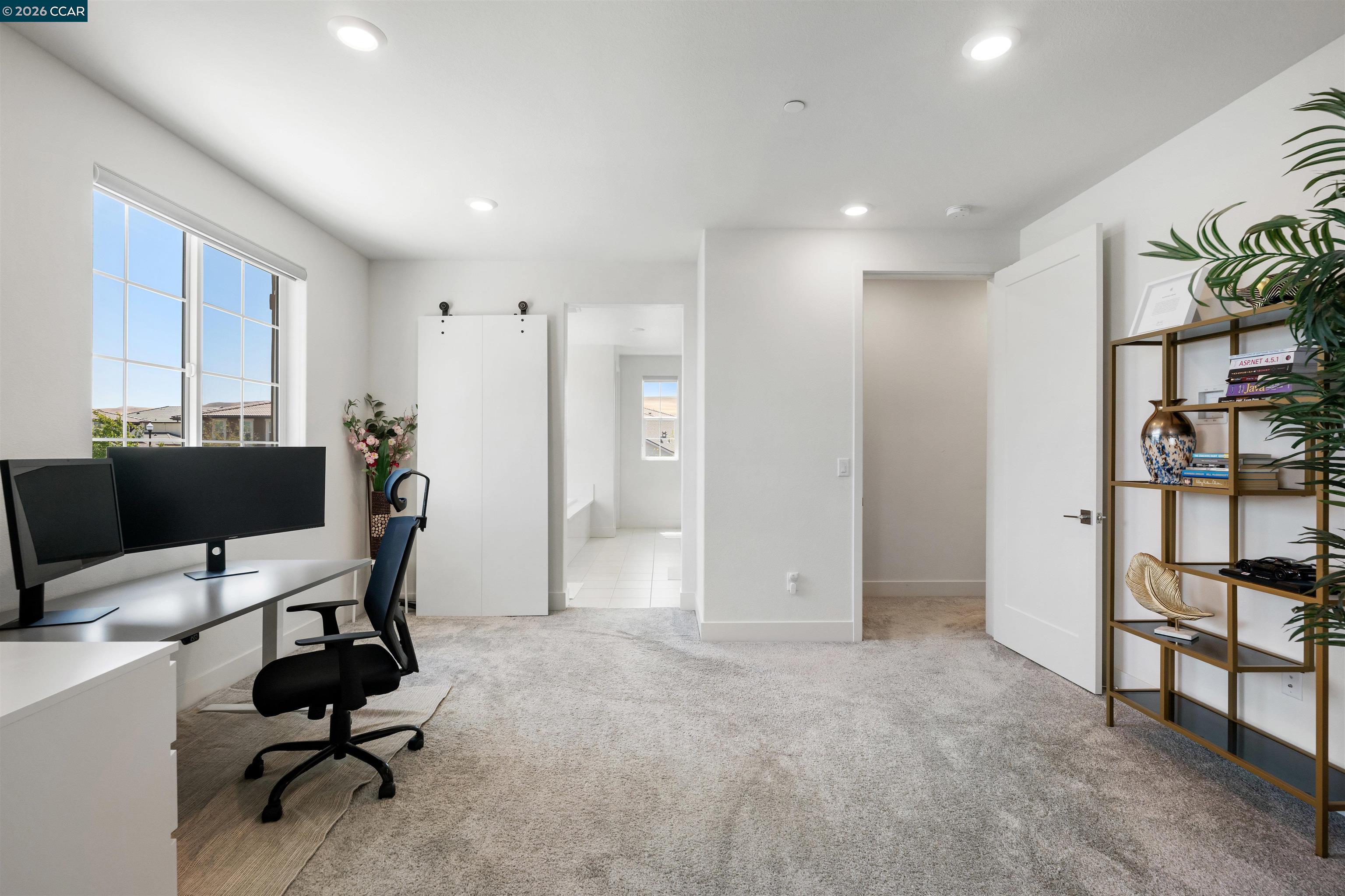 6274 Carousel Avenue Tracy, CA 95377 - Photo 25 of 46 a view of a workspace with furniture and a window
