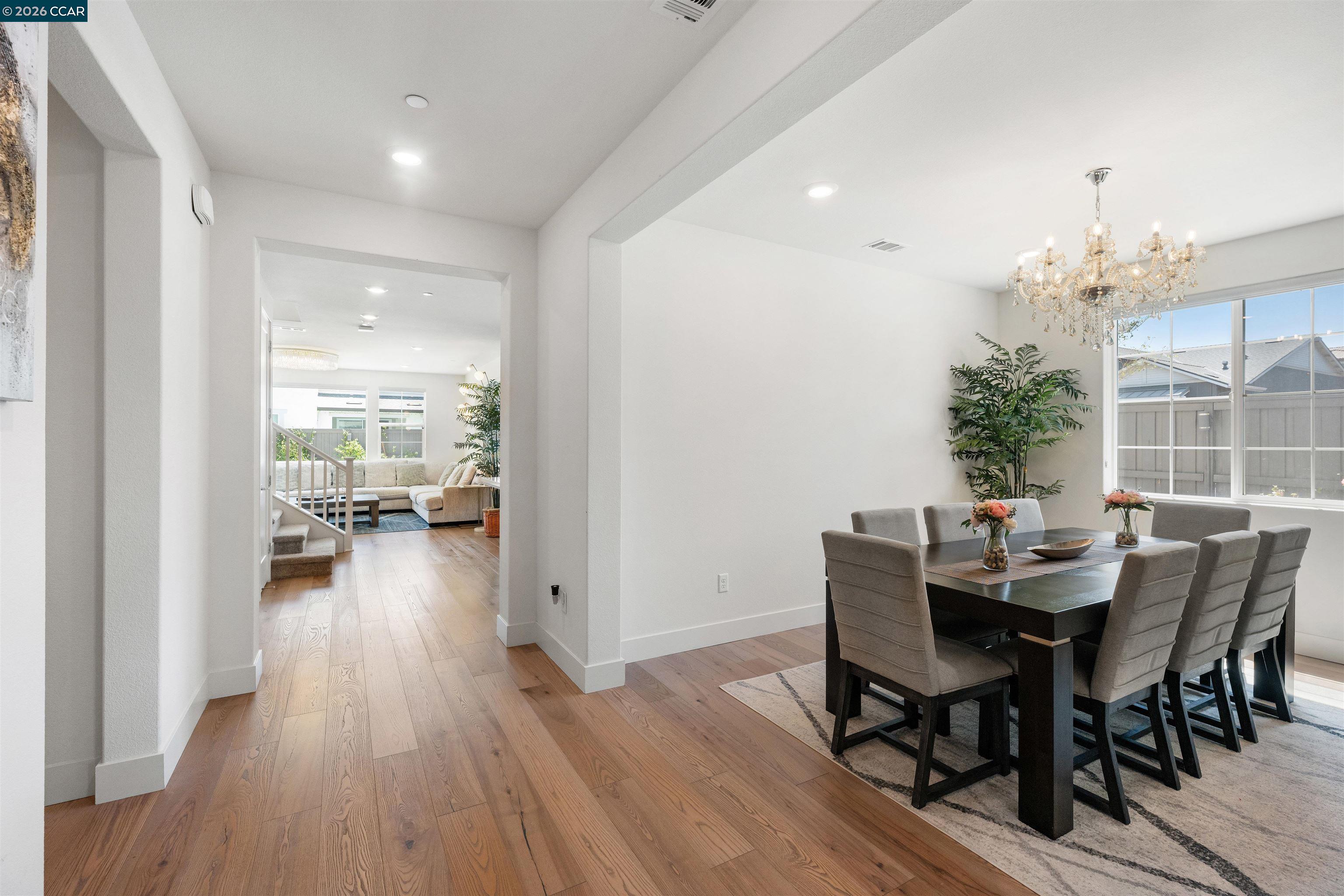 6274 Carousel Avenue Tracy, CA 95377 - Photo 3 of 46 a view of a dining room with furniture and wooden floor