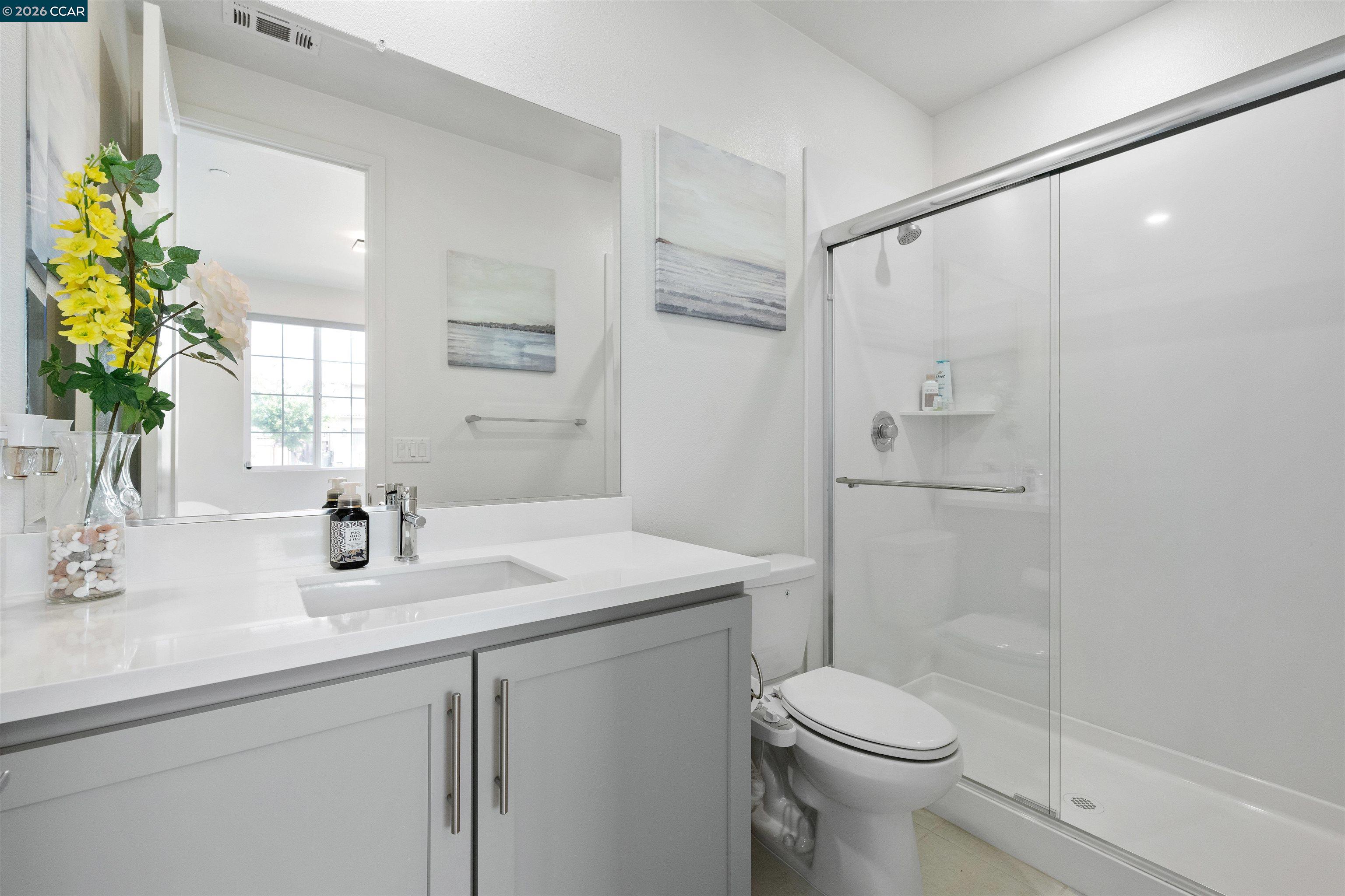 6274 Carousel Avenue Tracy, CA 95377 - Photo 34 of 46 a bathroom with a sink toilet and shower
