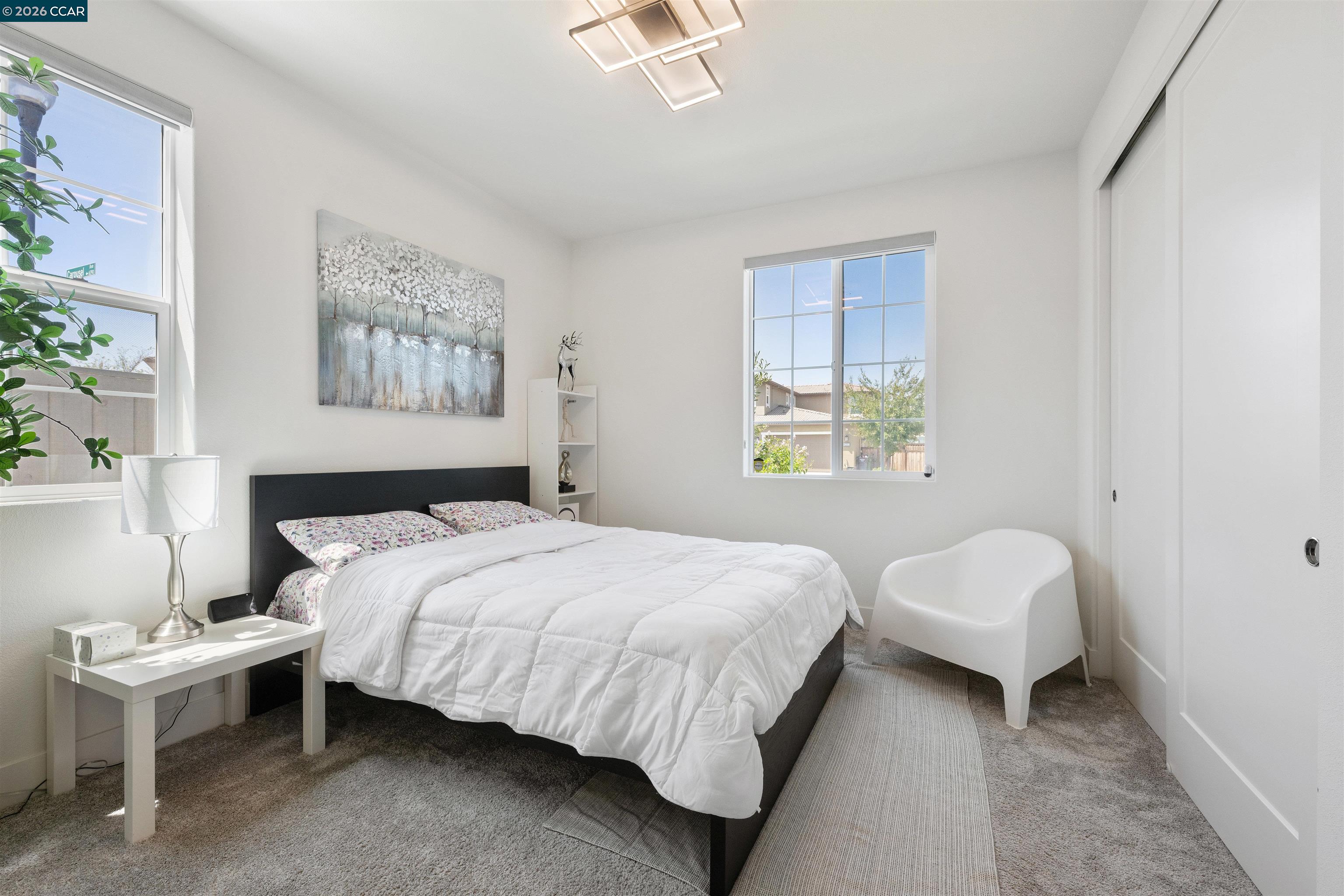 6274 Carousel Avenue Tracy, CA 95377 - Photo 36 of 46 a bedroom with a bed and a window
