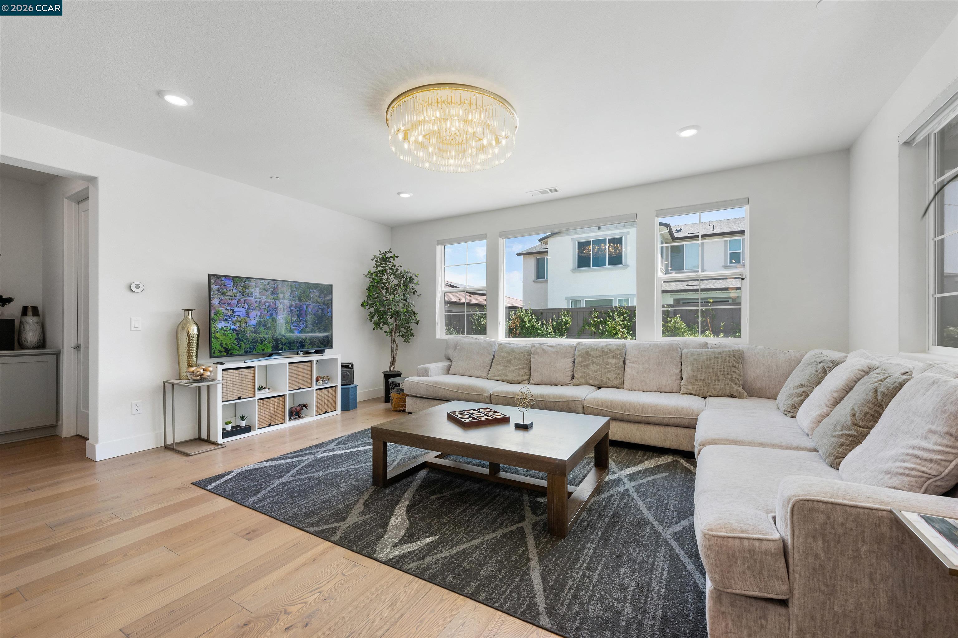 6274 Carousel Avenue Tracy, CA 95377 - Photo 7 of 46 a living room with furniture and a large window