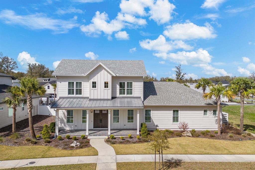 13236 Southwest 11th Road Newberry, FL 32669 - Photo 1 of 1 a front view of a house with a yard