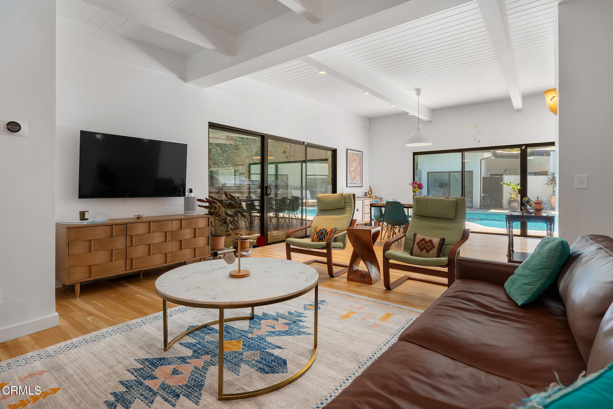 3581 Valley Meadow Road Sherman Oaks, CA 91403 - Photo 17 of 30 a living room with furniture and a flat screen tv