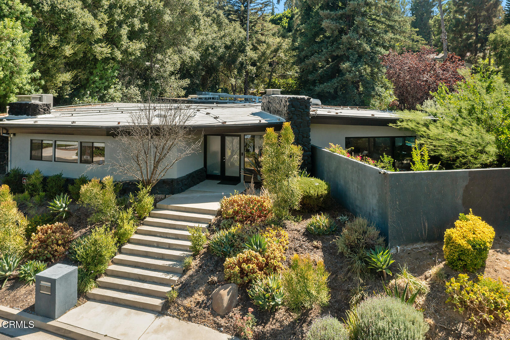 3581 Valley Meadow Road Sherman Oaks, CA 91403 - Photo 2 of 30 a view of a garden with pathway