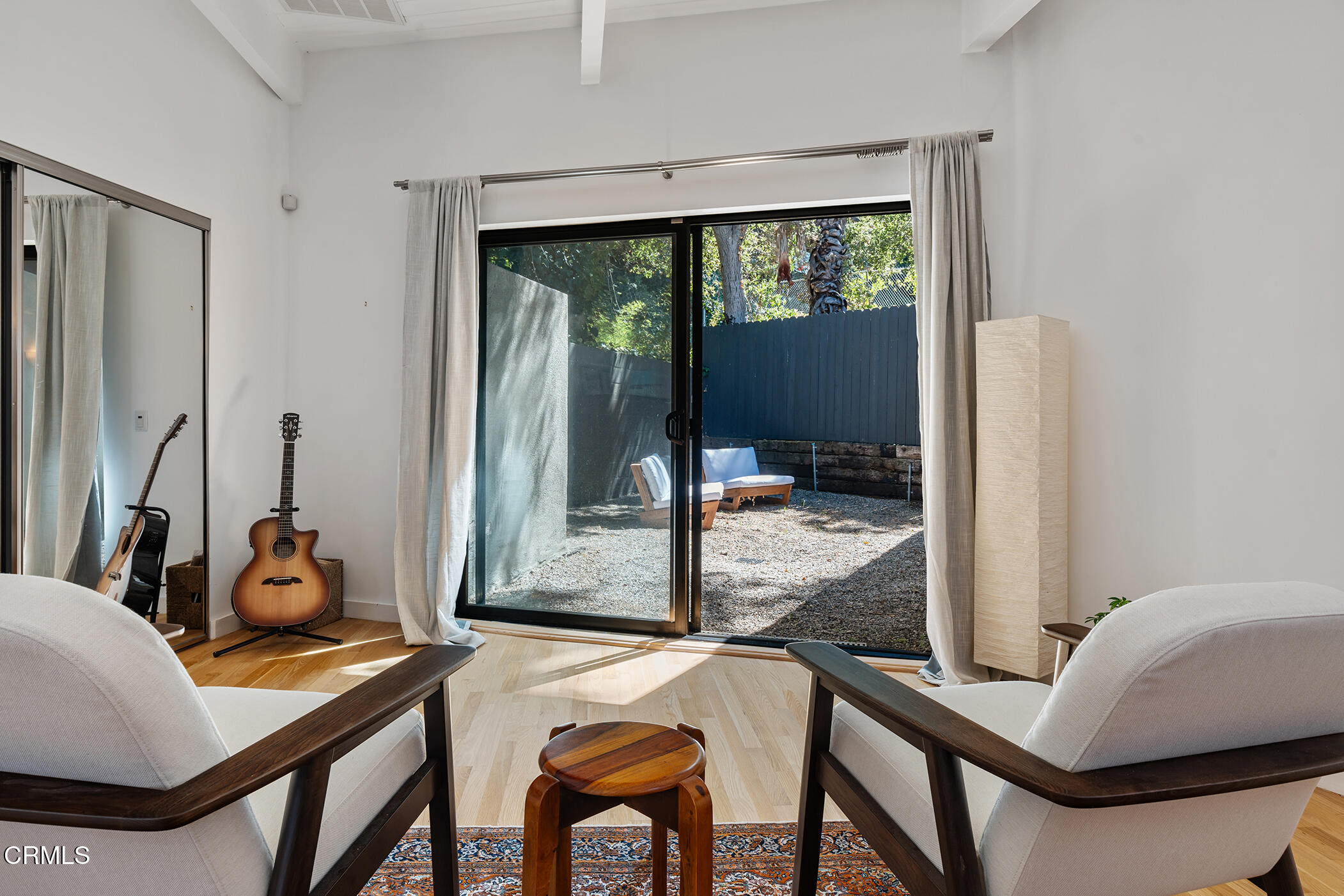 3581 Valley Meadow Road Sherman Oaks, CA 91403 - Photo 24 of 30 a view of a workspace with furniture and a window