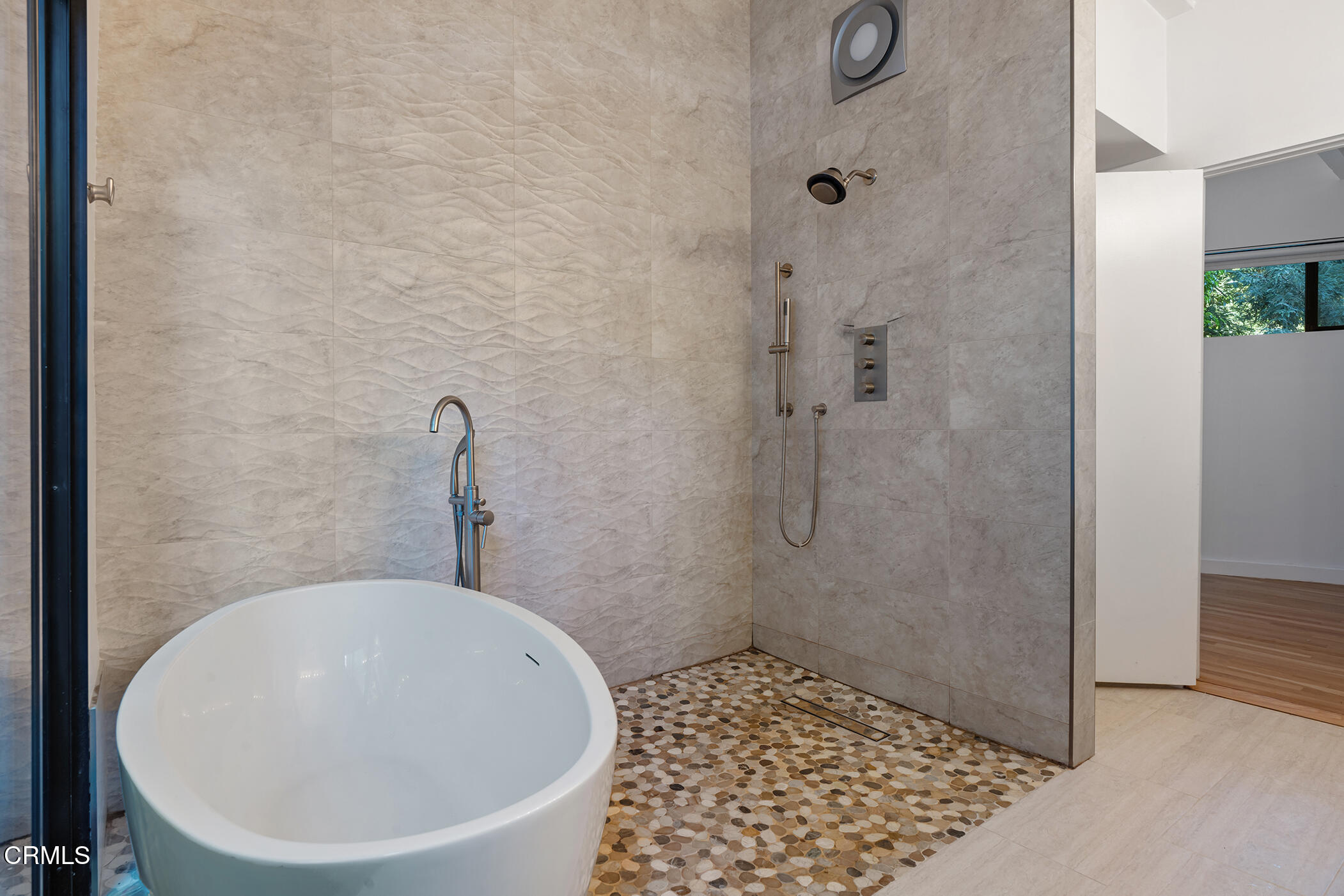 3581 Valley Meadow Road Sherman Oaks, CA 91403 - Photo 28 of 30 a bathroom with a sink and a shower