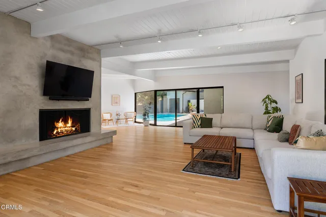 a kitchen with stainless steel appliances granite countertop a stove and a microwave