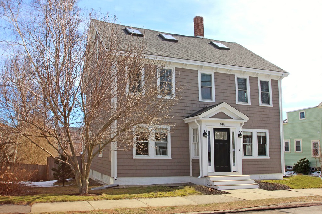346 Merrimac Street Newburyport, MA 01950 - Photo 1 of 30 a front view of a house with a yard