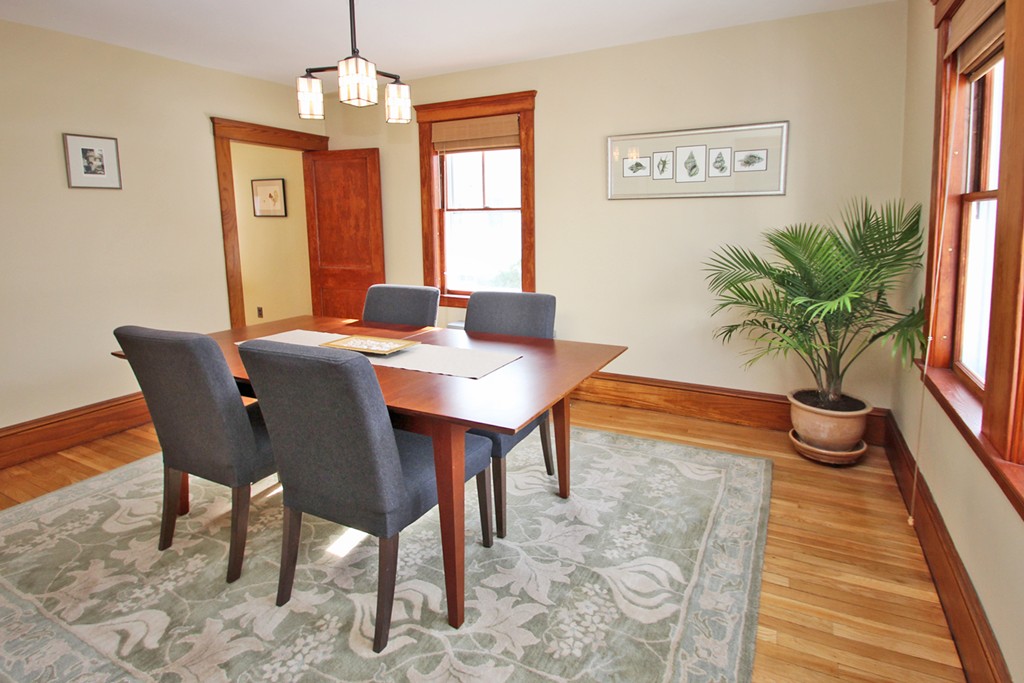346 Merrimac Street Newburyport, MA 01950 - Photo 11 of 30 a view of a dining room with furniture window and wooden floor