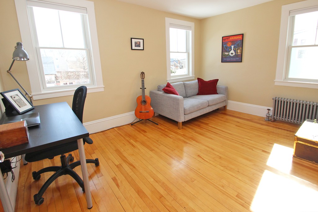 346 Merrimac Street Newburyport, MA 01950 - Photo 14 of 30 a bedroom with a bed and a window