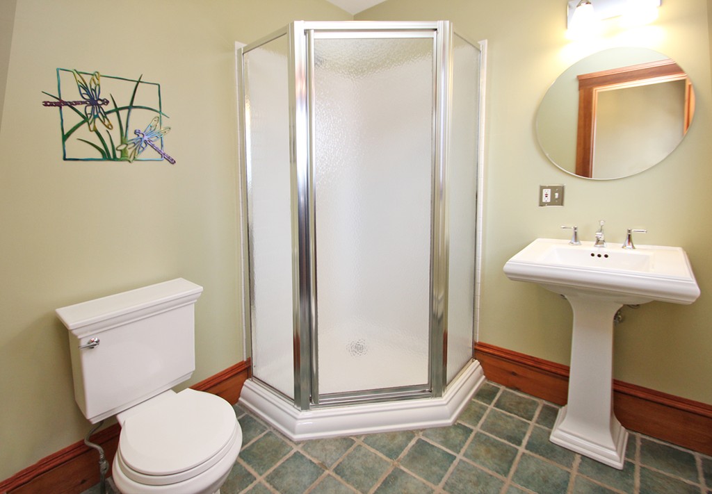 346 Merrimac Street Newburyport, MA 01950 - Photo 22 of 30 a bathroom with a sink mirror toilet and shower