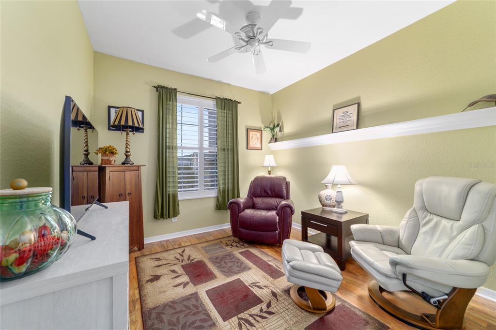 11888 Southeast 91st Circle Summerfield, FL 34491 - Photo 47 of 67 a living room with furniture and a rug