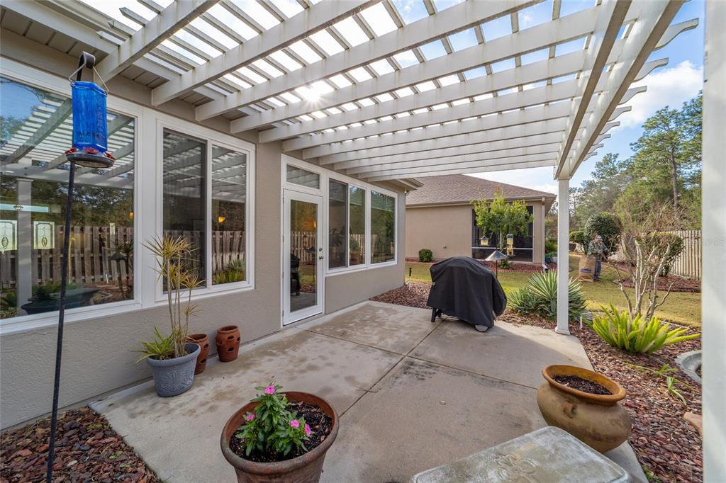 11888 Southeast 91st Circle Summerfield, FL 34491 - Photo 67 of 67 a house view with a seating space and garden view