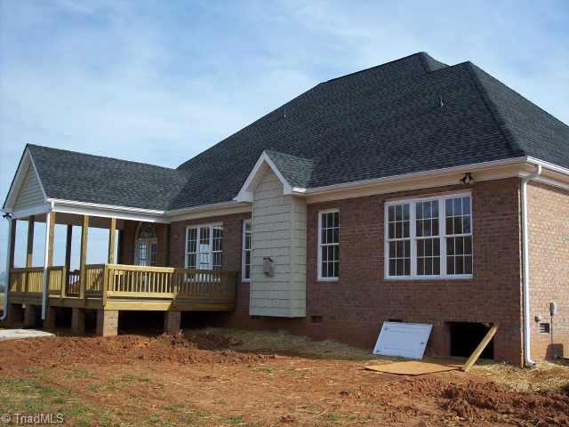 6 Baltimore Downs Road Advance, NC 27006 - Photo 2 of 9 Other. Covered Porch off Keeping Rm Overlooks Beautiful Cleared Acreage