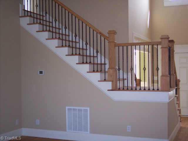 6 Baltimore Downs Road Advance, NC 27006 - Photo 6 of 9 Other. Open Oak Staircase with Iron Spindles Leads from Living Rm to 3 Upper Bedrooms