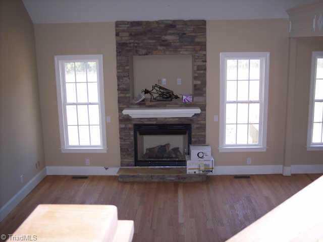 6 Baltimore Downs Road Advance, NC 27006 - Photo 7 of 9 Other. From the Staircase View the Beautiful Stone Fireplace in Living Rm