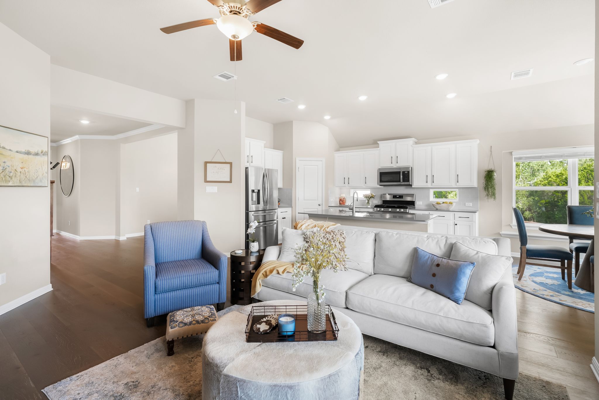 300 Prato Place Georgetown, TX 78628 - Photo 40 of 40 An open floorplan seamlessly connects the living area to a chef's kitchen, creating a harmonious and functional space.